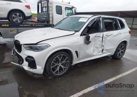 2022 BMW X5 Phev xDrive45E z USA, uszkodzony, nr VIN 5UXTA6C01N9J19119